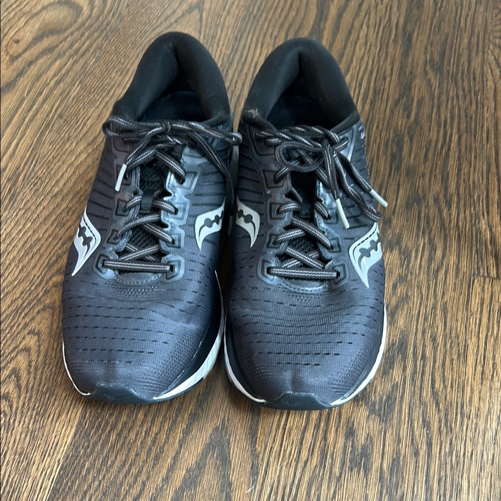 Saucony Black Athletic Running Shoes. Size 11. NWT. Black/white. Slight defect